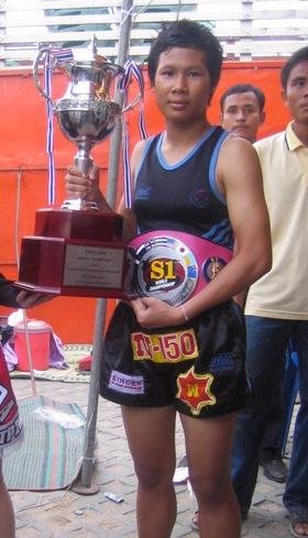 Jomyutying Kiat Nor Vor went on to win the S-1 tournament, winning the semi-final by TKO with a cut almost identical to mine, and winning the final on points.